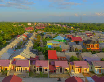 Aerial view of a colorful residential neighborhood, representing scalable and energy-efficient water solutions tailored to diverse communities