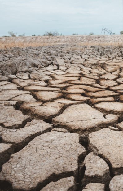 Parched, cracked ground illustrating the failure of traditional water solutions in addressing drought and water scarcity